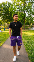 "DollarDorado" shorts (thick fleece). Logo and "DD" lettering embroidered in gold thread. Laces with gold metal tips. Navy blue (15 units available). 2 sizes S, 5 sizes M, 8 sizes L. Limited edition. Limited purple sizes: 3 small, 5 medium, 7 large